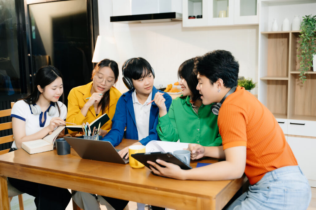Students improving analytical thinking and collaborative learning through Small Group Math Tuition in Singapore and guided Mathematics discussions.