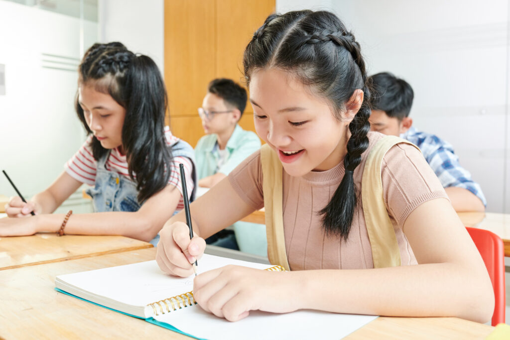 Students improving confidence and structured thinking while learning how to solve PSLE problem sums through consistent Mathematics practice.
