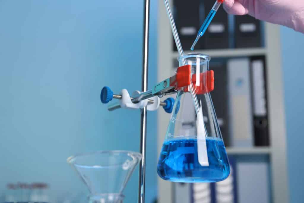 Burette and conical flask set up for a titration in O Level Chemistry Paper 3 practical work