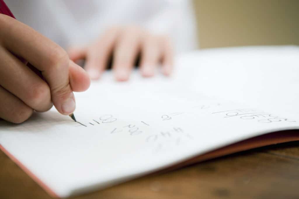 Written working steps on a PSLE maths question, which can earn a method mark when the final answer is wrong